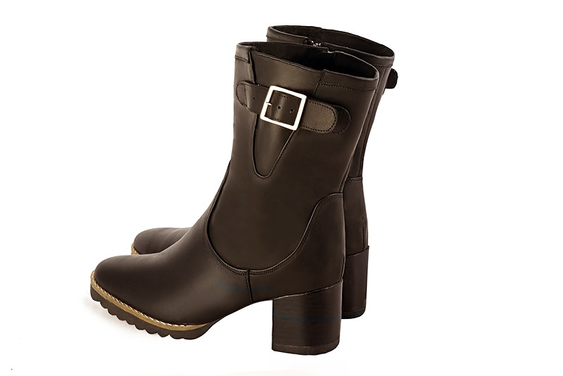 Dark brown women's ankle boots with buckles on the sides. Round toe. Medium block heels. Rear view - Florence KOOIJMAN